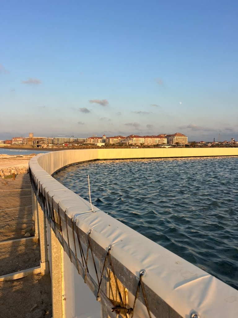 The pool and Sea Breeze Resort coastline